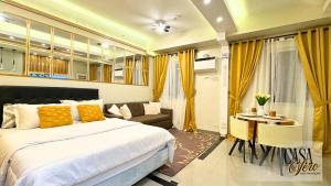 Photo de la galerie de l'établissement Casa Vero Elegant, Spacious Condo, with 4 Pools, à Manille