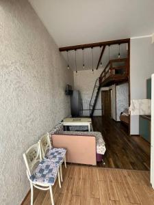 Posezení v ubytování Студия лофт