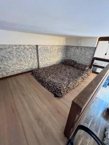 Postel nebo postele na pokoji v ubytování Студия лофт