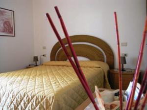 Postel nebo postele na pokoji v ubytování Agriturismo Podere San Michele