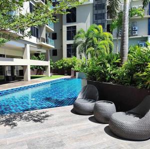 Bazén v ubytování Uptown Palms 1BR Suite Fuente, Walk to CebuDoc nebo v jeho okolí