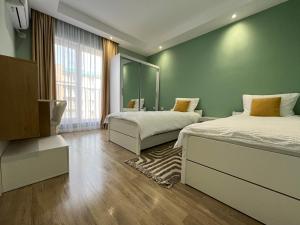 Φωτογραφία από το άλμπουμ του Cosmopolis Family Apartment - Pools & Gym σε Ştefăneştii de Sus