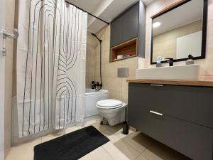 Φωτογραφία από το άλμπουμ του Cosmopolis Family Apartment - Pools & Gym σε Ştefăneştii de Sus
