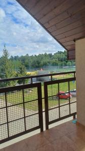 Balkón nebo terasa v ubytování Mieszkanie na poddaszu + 5 fotografií