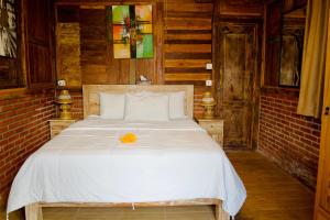 Ένα ή περισσότερα κρεβάτια σε δωμάτιο στο alain villas & rooms +15 φωτογραφίες