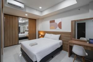 Ένα ή περισσότερα κρεβάτια σε δωμάτιο στο Cove Merakey