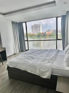 LA Serviced Apartmentにあるベッド