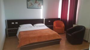 Voodi või voodid majutusasutuse Hotel Alpet toas