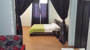 Voodi või voodid majutusasutuse Hotel Alpet toas
