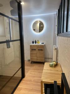 a bathroom with a sink and a mirror at Gîte PREY DES VOSGES in Prey +3 photos