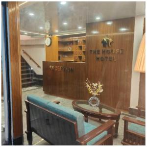 a room with a couch and a table in a room at The House Hotel Darjeeling in Darjeeling +35 photos