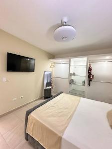 TV a/nebo společenská místnost v ubytování family apt centric near historic center boardwalk