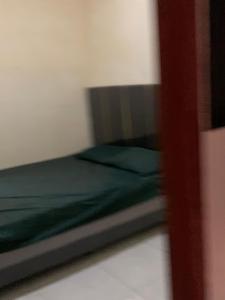 Una cama o camas en una habitación de soft homestay