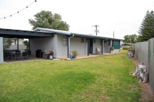 a house with a yard in front of it at Seabliss in Lancelin