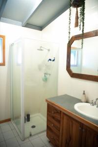 a bathroom with a shower and a sink at Seabliss in Lancelin
