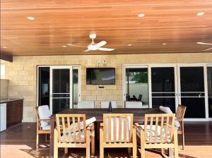 a dining room with a table and chairs at Things of Stone and Wood in Lancelin