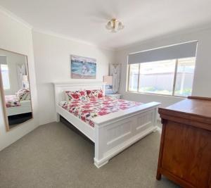 Postel nebo postele na pokoji v ubytování White Sands