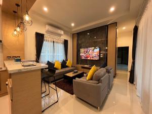 Μια τηλεόραση ή/και κέντρο ψυχαγωγίας στο Leigh Villa