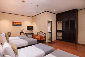 Postel nebo postele na pokoji v ubytování Oak Ray Colombo City Hotel + 88 fotografií