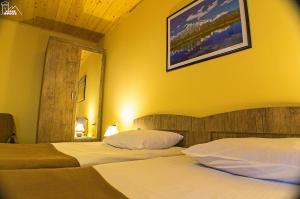 Letto o letti in una camera di Becho House