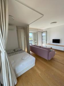 Katil atau katil-katil dalam bilik di Apartment LEON
