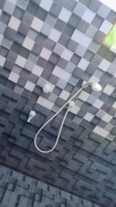 a shower head on the ceiling of a bathroom at Blooming Mirissa in Mirissa +31 photos