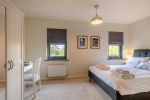 Postel nebo postele na pokoji v ubytování Elice Cottage