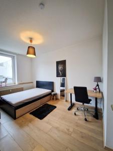 Cama o camas de una habitación en 2-room apartment only 14 minutes to Düsseldorf main station