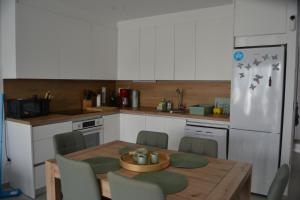 Kuchyň nebo kuchyňský kout v ubytování Mariposa Eterna