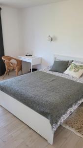 Ένα ή περισσότερα κρεβάτια σε δωμάτιο στο Vila Country Mornings