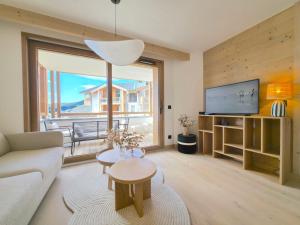 TV a/nebo společenská místnost v ubytování T2 d'exception avec piscine et SPA - Parking privé