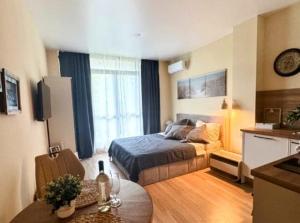 Postel nebo postele na pokoji v ubytování Wave & Wellness Studio + 41 fotografií