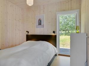 Postel nebo postele na pokoji v ubytování Holiday Home Topenga - 300m from the sea by Interhome + 16 fotografií