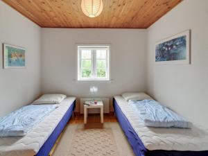 Ένα ή περισσότερα κρεβάτια σε δωμάτιο στο Holiday Home Kristine - 4km from the sea by Interhome +7 φωτογραφίες