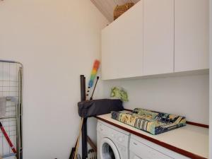 Kuchyň nebo kuchyňský kout v ubytování Holiday Home Axel - 1-2km from the sea by Interhome