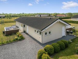 an overhead view of a house with a garden at Holiday Home Reimer - 700m from the sea by Interhome in Neder Lysabild