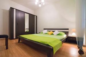 Posteľ alebo postele v izbe v ubytovaní Apartment J&I