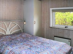 Giường trong phòng chung tại Holiday Home Aasa - 200m from the sea by Interhome +14 ảnh