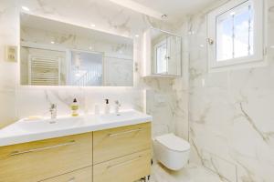 Et badeværelse på Le Duplex - à 10 minutes de Paris + 15 billeder