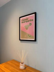 a picture of a wine glass on a wall at 10 Popeshead in York