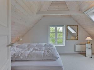 Ένα ή περισσότερα κρεβάτια σε δωμάτιο στο Holiday Home Thorben - 3-5km from the sea by Interhome