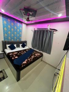 Postel nebo postele na pokoji v ubytování Neelkanth pg house + 19 fotografií