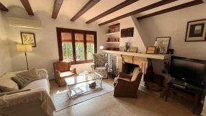 TV a/nebo společenská místnost v ubytování Magnifico Chalet en Jávea a 5 minutos de la playa.