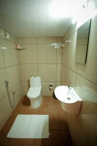 Koupelna v ubytování Cozy Nest Villa + 31 fotografií