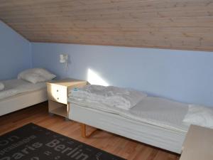 Voodi või voodid majutusasutuse Apartment Nilaus - 2-3km from the sea by Interhome toas +8 fotot