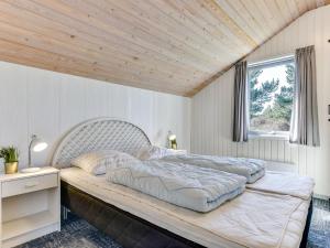 Ένα ή περισσότερα κρεβάτια σε δωμάτιο στο Holiday Home Niyazi - 3-1km from the sea by Interhome