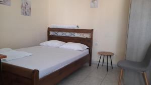 Postel nebo postele na pokoji v ubytování Απεριόριστη θέα