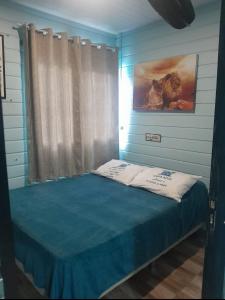 Ένα ή περισσότερα κρεβάτια σε δωμάτιο στο Casa com Piscina e Área Gourmet 3 Quartos na Praia