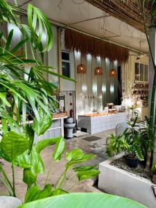 a store with plants in the middle of a room at The PARK Society in Chiang Mai