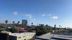 a view of a city with palm trees and buildings at Culver Hideaway Private Room with Share Living Space C1 in Los Angeles
